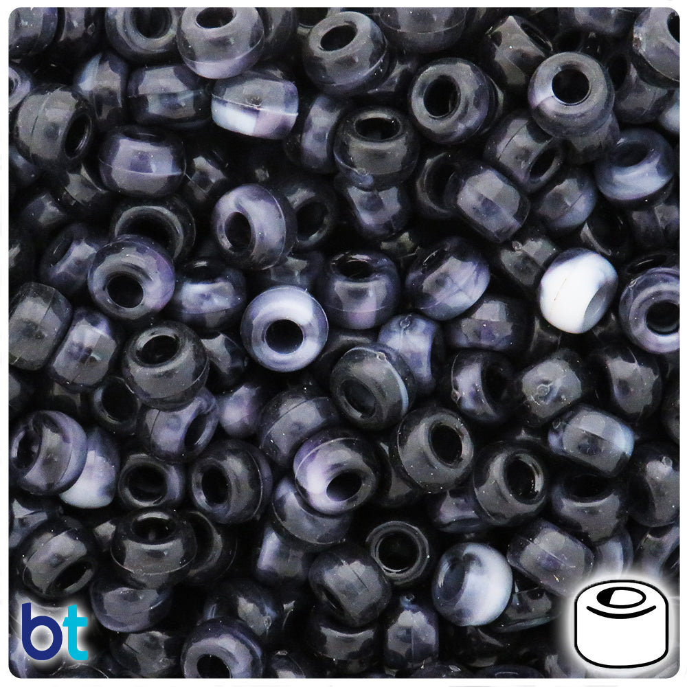 Close-up of black and white beads with brand logo 'bt' in the corner.